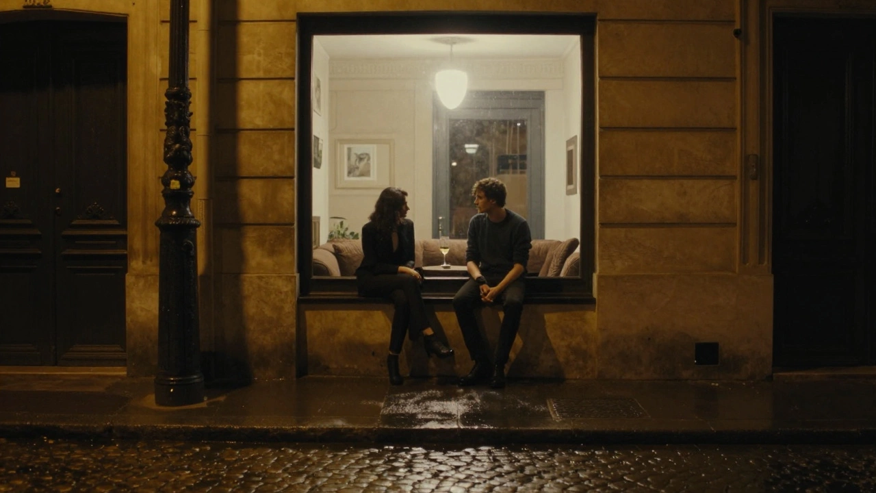A taxi departs from a Paris building at night, two silhouettes sit together in a softly lit window, sharing silent presence in the rain.