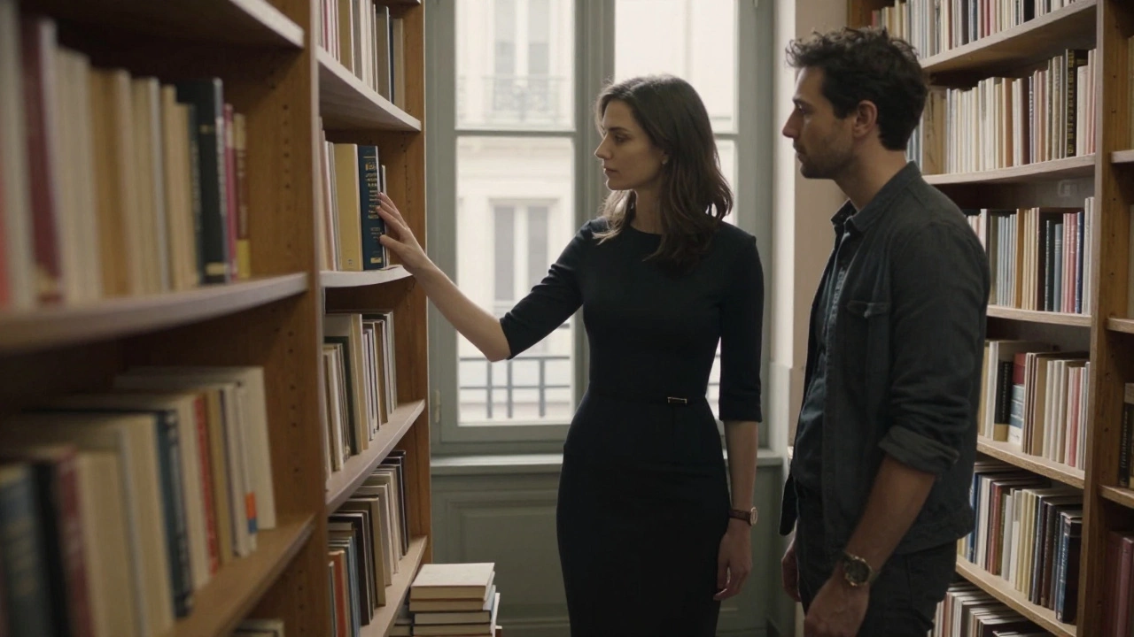A woman browses books in a quiet Parisian bookstore, sunlight streaming through windows, a man watches respectfully from afar.